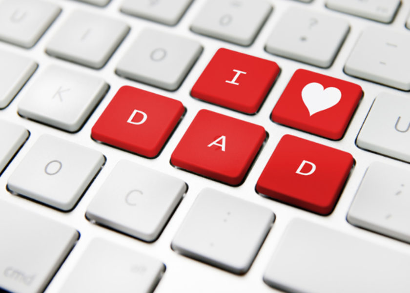 Father's day message on a white keyboard